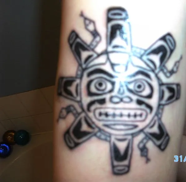 Real community tattoo placement: Adam - Haida sun