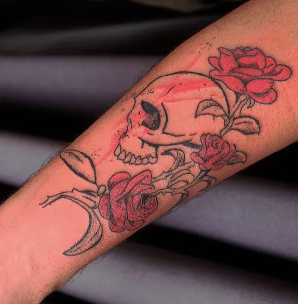 Real community tattoo placement: Adam Ink - Skull & roses