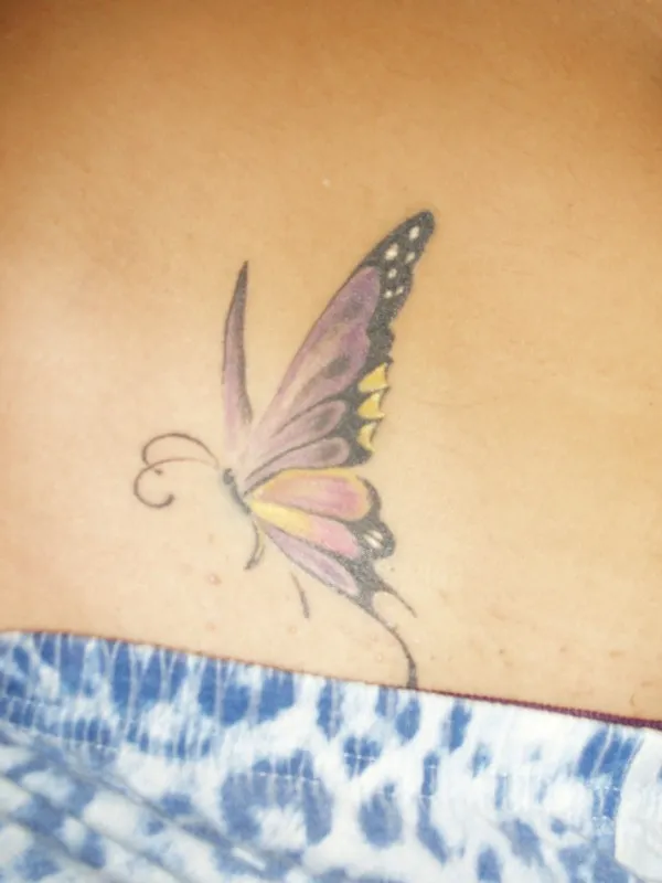 Real community tattoo placement: Adele - farfalla