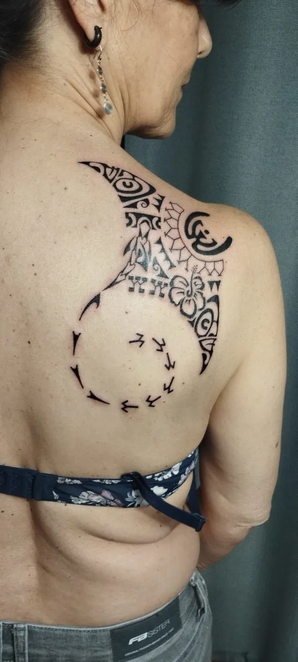 Real community tattoo placement: Aida - Uanana manta