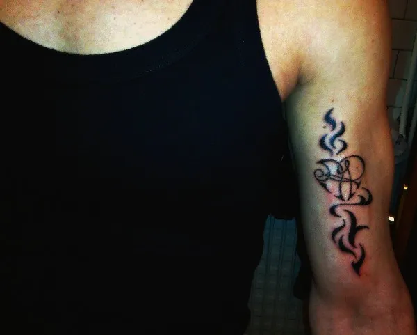 Real community tattoo placement: Alberto - Fire AR heart