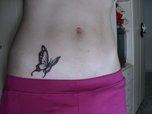 Real community tattoo placement: Alessandra - Butterfly