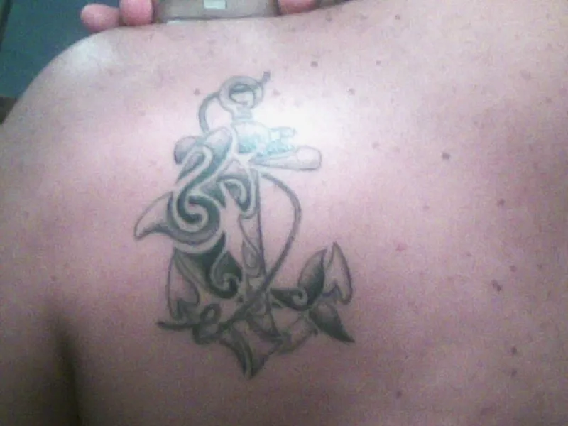 Real community tattoo placement: Alessandro - Ancora & delfino