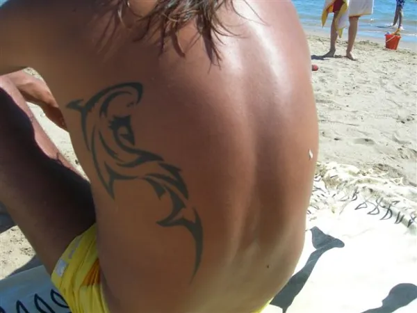 Real community tattoo placement: Alfonso - shark