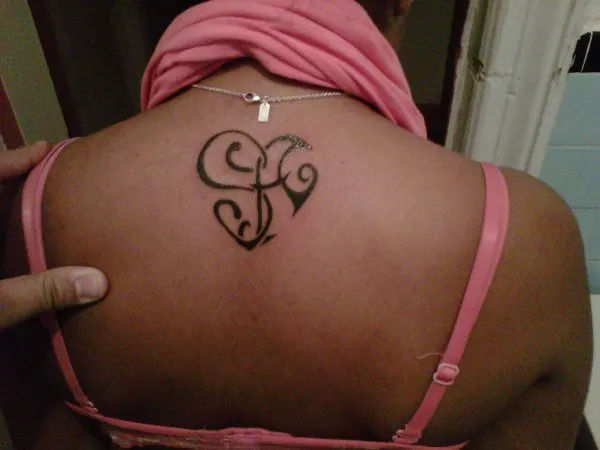 Real community tattoo placement: Amaya - S+A heart