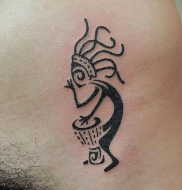 Real community tattoo placement: Americo - Rasta kokopelli