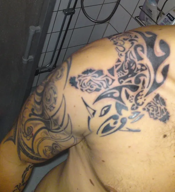 Real community tattoo placement: Anders - Maori koi