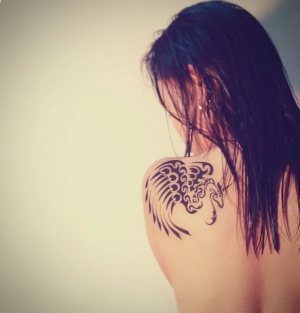 Real community tattoo placement: Ann - Winged unicorn