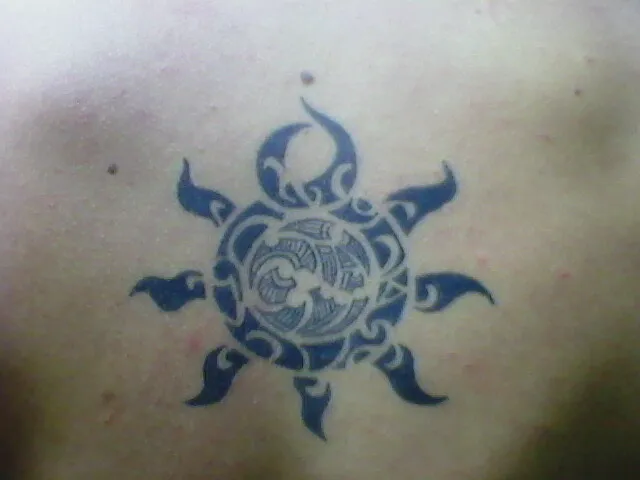 Real community tattoo placement: Anna - Sun twist