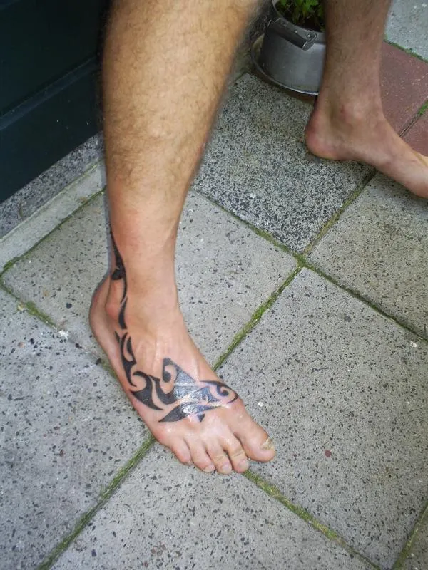 Real community tattoo placement: Augustus - Shark