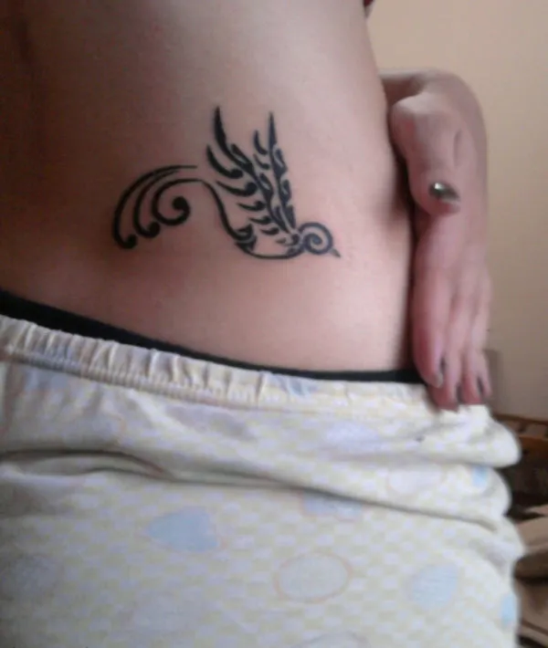 Real community tattoo placement: Beatriz - Swallow