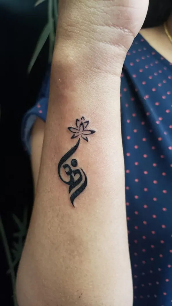 Real community tattoo placement: Bhavia - Aum lotus