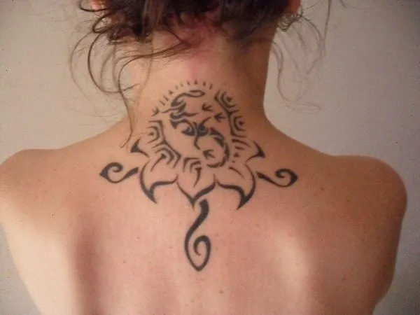 Real community tattoo placement: Carmen - Sun lizard Ankh