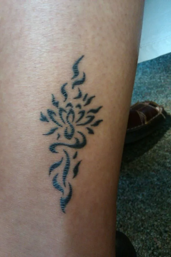 Real community tattoo placement: Cheryl - Lotus fire