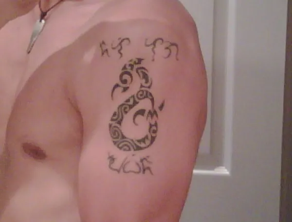 Real community tattoo placement: Chris - Baybayin and Anahera