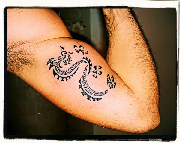 Real community tattoo placement: Chris - Maori style dragon