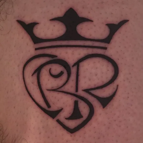 Real community tattoo placement: Christian - C+B+R heart
