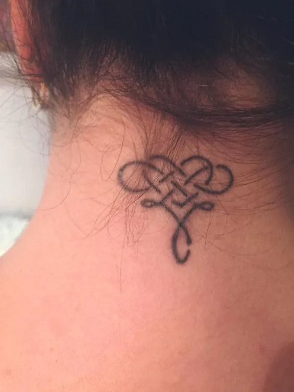 Real community tattoo placement: Claudia - J+C infinity heart