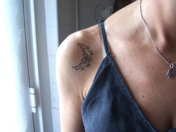 Real community tattoo placement: Cristina - Triskell moon