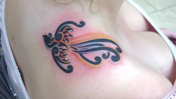 Real community tattoo placement: Dakota - Small phoenix