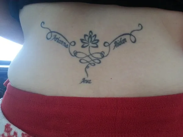 Real community tattoo placement: Dionne - lotus lowerback