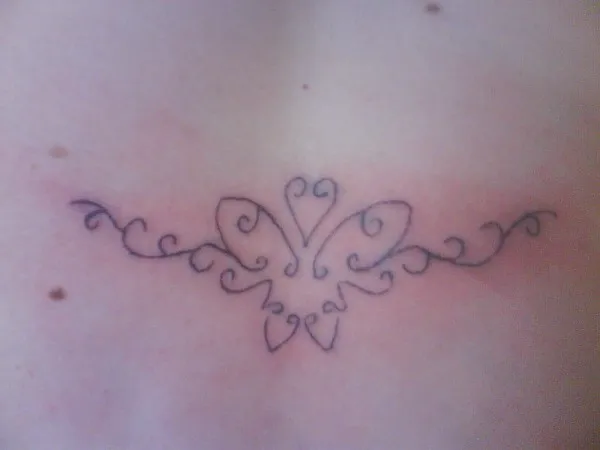 Real community tattoo placement: Yvonne - Butterfly lowerback