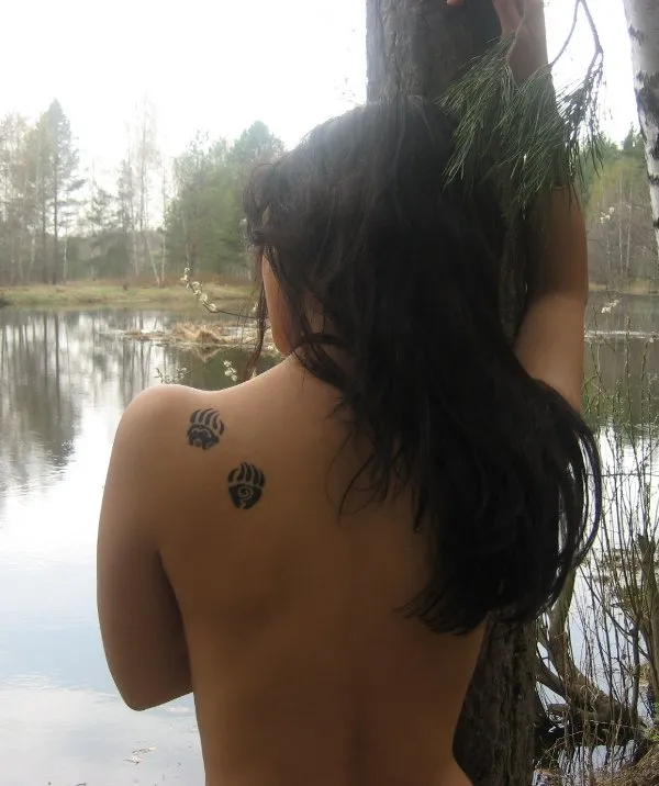 Real community tattoo placement: Maria - Bear paws
