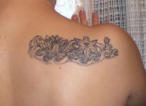 Real community tattoo placement: Elisa - Flowers and waves