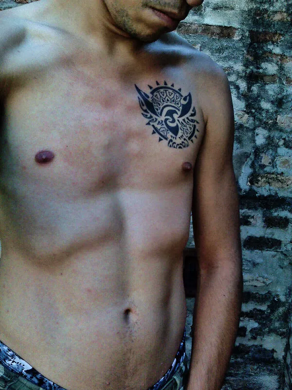 Real community tattoo placement: Emilio - Sun and eagle