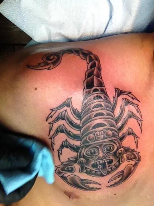Real community tattoo placement: Erick - Aztec scorpion