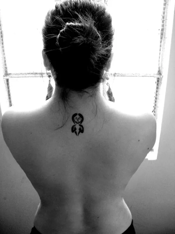 Real community tattoo placement: Eugenia - Twin sisters