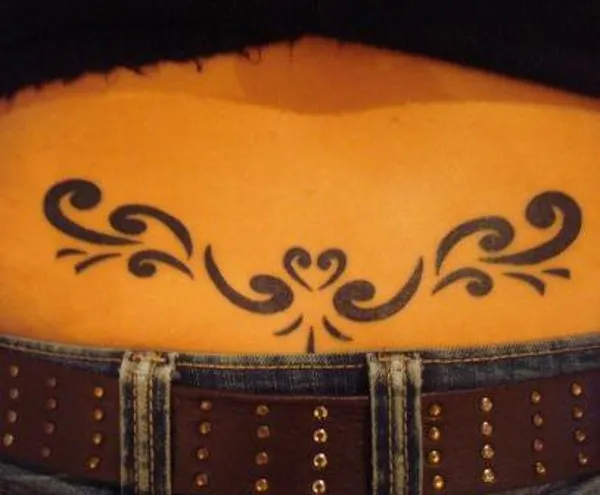 Real community tattoo placement: Gabi - Koru lowerback