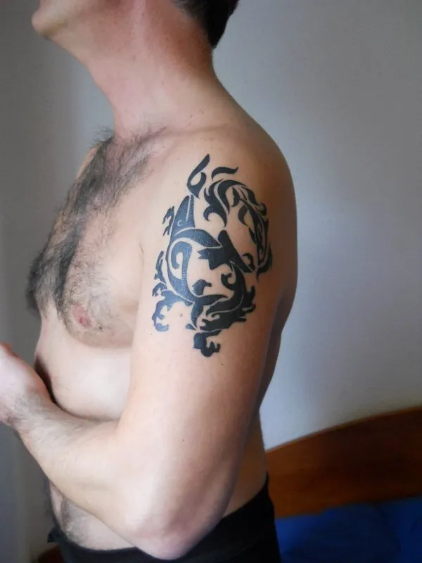 Real community tattoo placement: Gabriel - Whale and dolphin