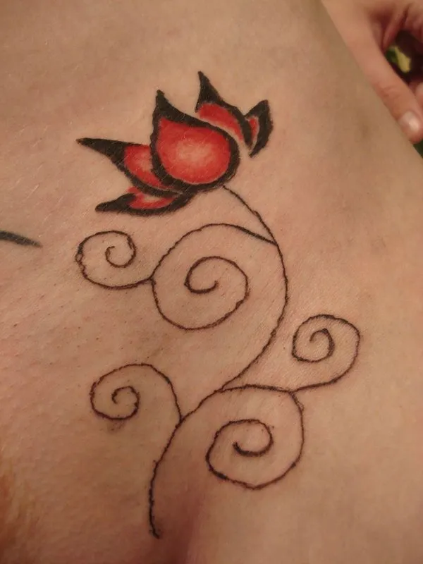 Real community tattoo placement: GhostRoses - Lotus