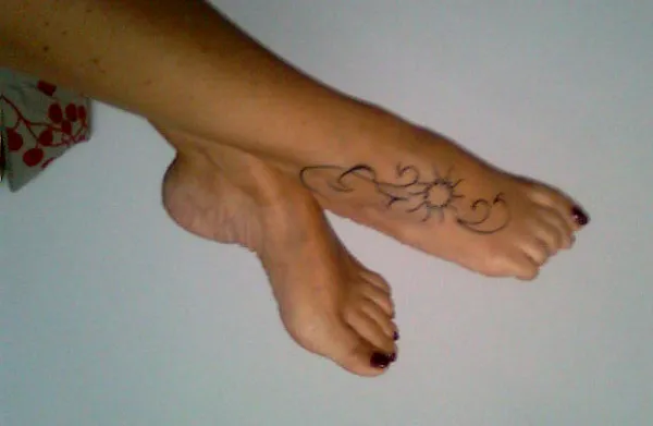 Real community tattoo placement: Giorgia - Sun waves