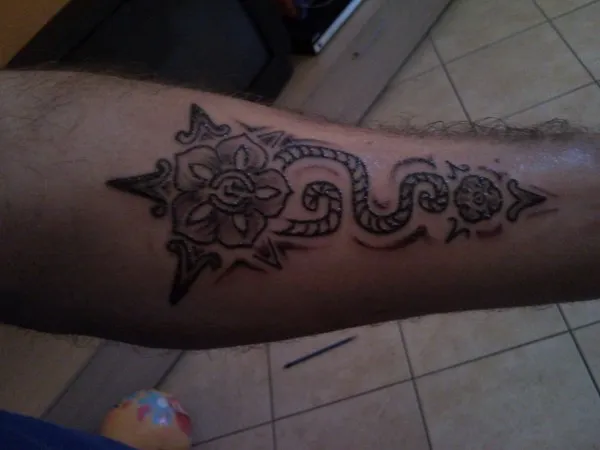 Real community tattoo placement: Giuliano - Aztec flower