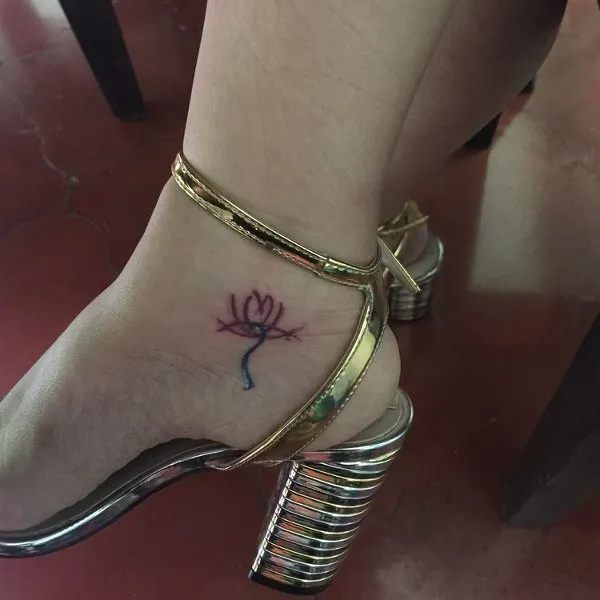 Real community tattoo placement: Gracia - M lotus