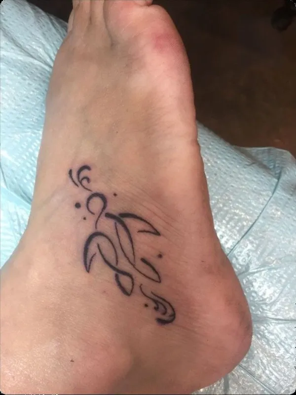 Real community tattoo placement: Guest - NK turtle