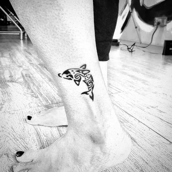Real community tattoo placement: Guest - Dolphin