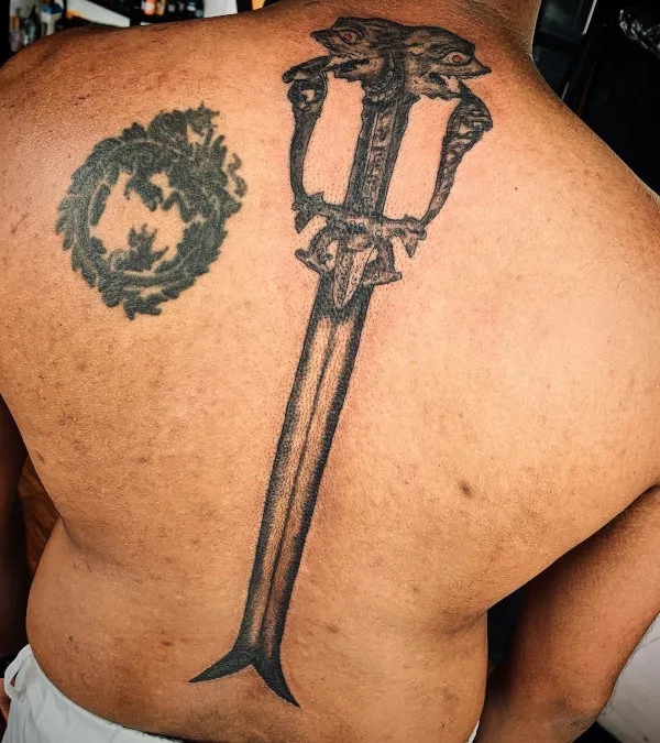 Real community tattoo placement: Guest - Feng Shui dragon