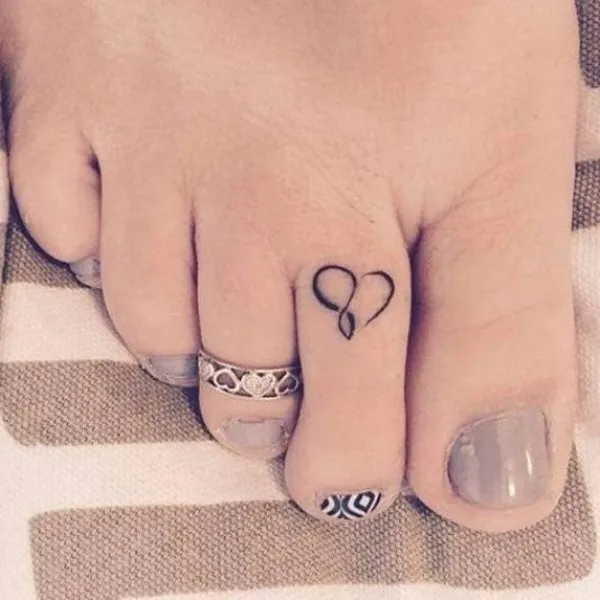 Real community tattoo placement: Guest - Infinity heart