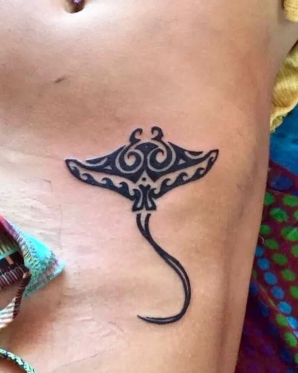 Real community tattoo placement: Guest - manta
