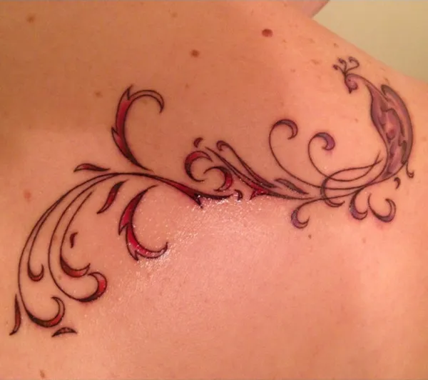 Real community tattoo placement: Guest - rebirth phoenix