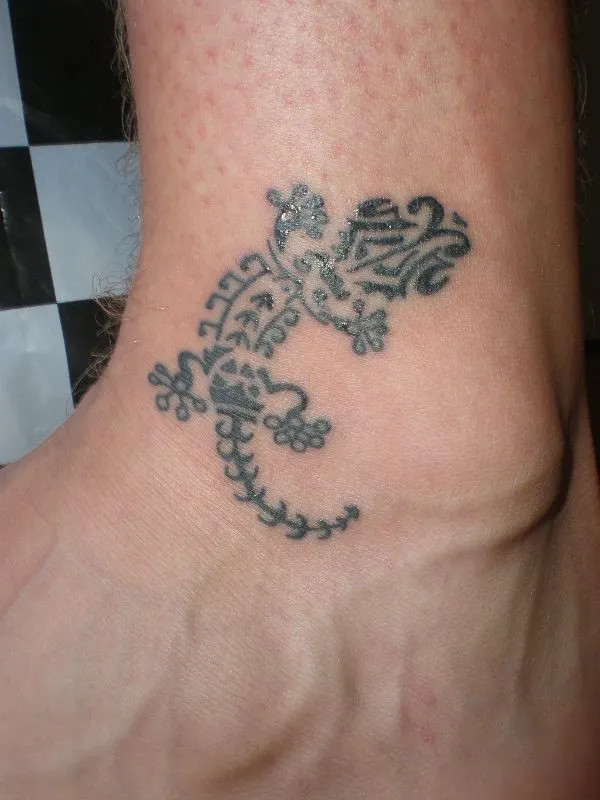 Real community tattoo placement: Guy - Maori gecko