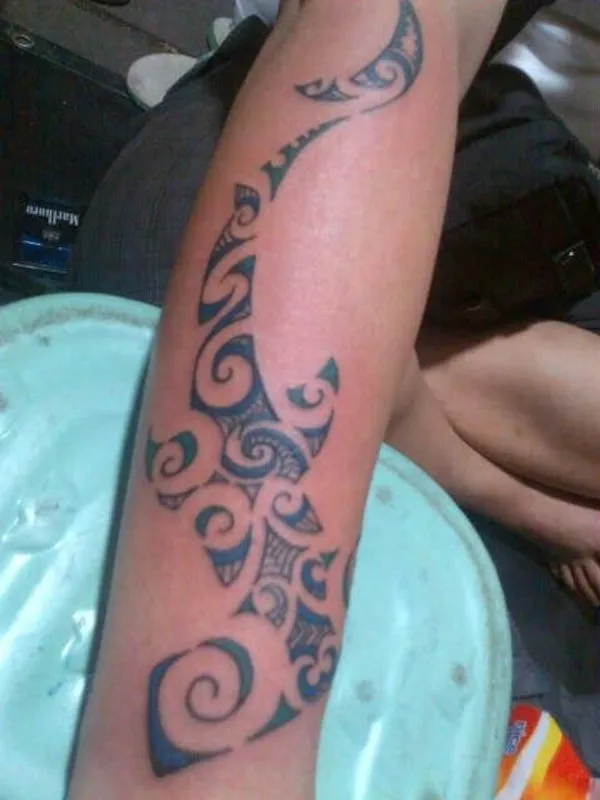 Real community tattoo placement: Iann - Maori hammerhead shark