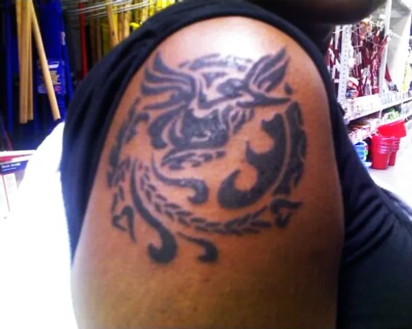 Real community tattoo placement: Ilaine - Sun phoenix
