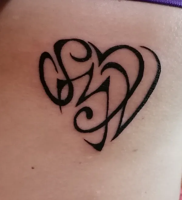 Real community tattoo placement: Iolanda - S+M+V+I heart