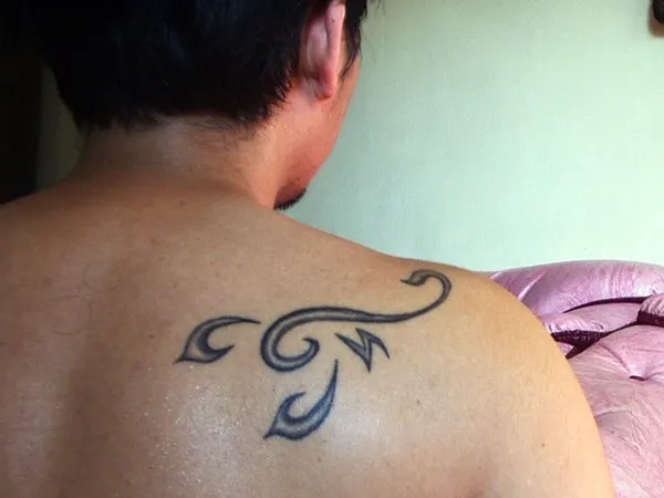 Real community tattoo placement: James - Stylized scorpion