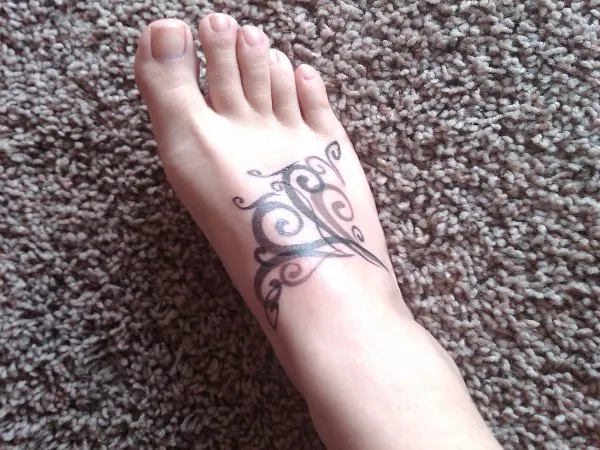 Real community tattoo placement: Jeri - Wind manta