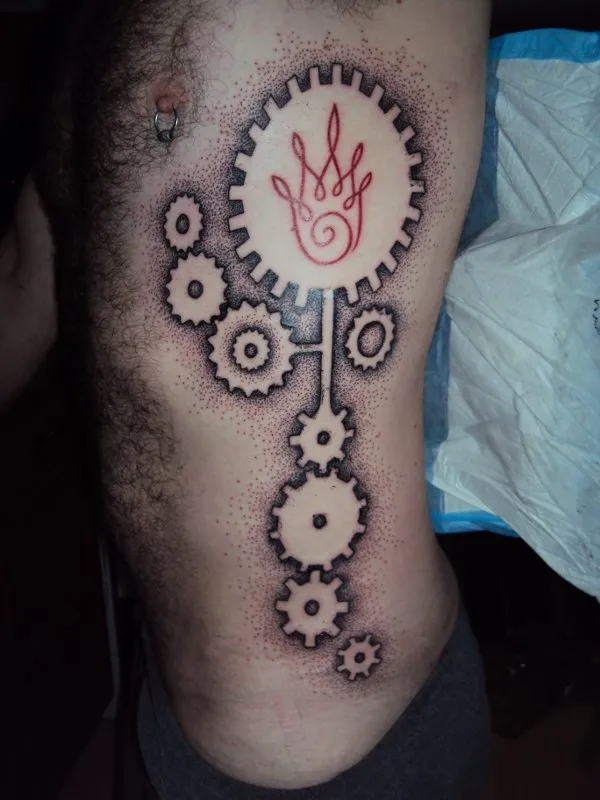 Real community tattoo placement: Jesse - Fire & gears